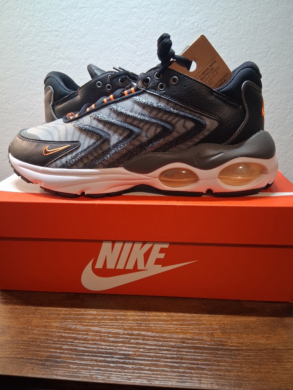 Nike Men’s Black and Gray Running Sneakers with Orange Highlights